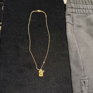 Gold tone Necklace with Pendant with C charm